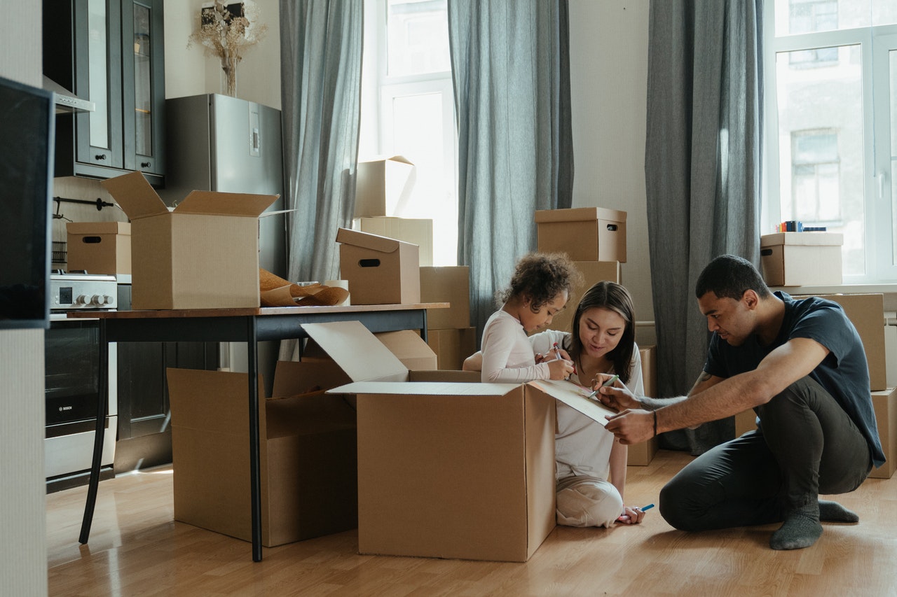 Family loading boxes for the Indianapolis Moving Company 